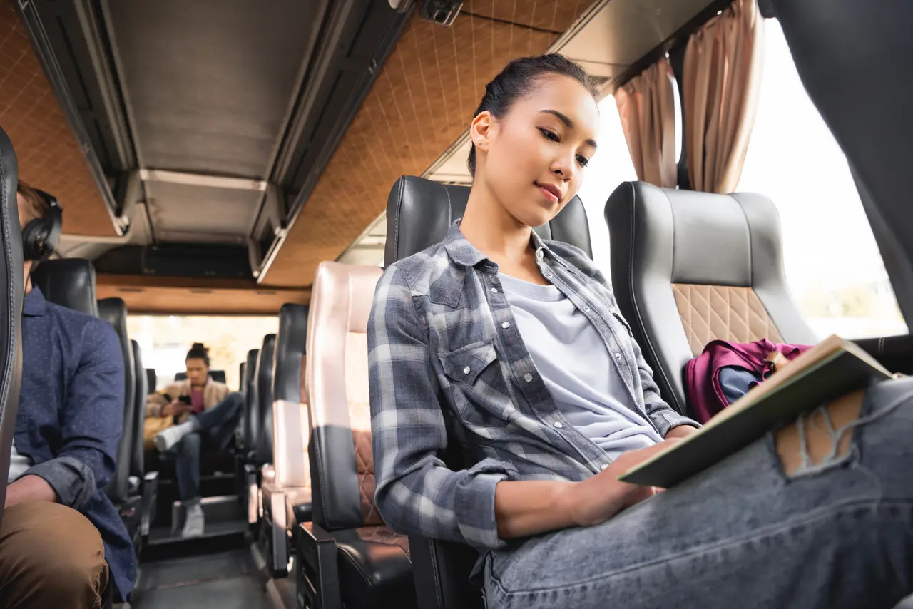 Passengers seated inside a coach
